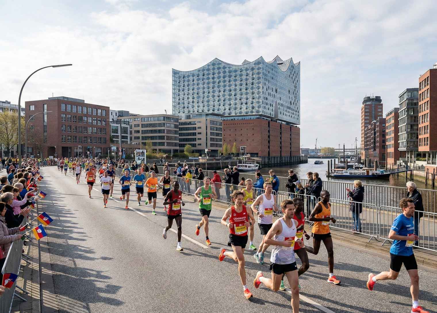 Hamburg Marathon Läufer in der HafenCity mit Elbphilharmonie im Hintergrund – Deutschlands größter Frühjahrsmarathon